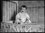 Tots- Barbara Sits In Crib by George French