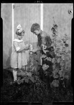 Young Boy And Girl In The "Hollyhocks" by George French