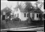 K.F. Mose Morton (W. Libby) Home- Three People In Front Of House by George French