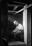 (George) Man In Cellar Sorting Flower Bulbs by George French
