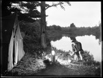 Bill Cooks Near Tent, Lake Behind-- Porter by George French