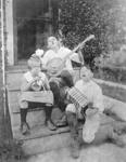 Three Children Playing Instruments On Steps Of House, Acting Up In New Jersey by George French