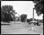 Students On Lawn With Building Of Bates College Behind by George French