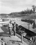 Couple Getting Ready To Go Fishing At Moosehead Lake by George French