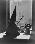 Shot Of Witch And Pumpkins In Window by George French