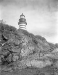 View From Low Showing Ledge And Only Top Half Of Quoddy Head Light by George French