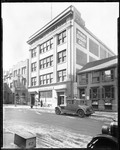 The Newark Sunday Call Building In The City Between A Book Shop And Blums Hem Stitching And Pleating Service Store--Newark, New Jersey by George French