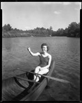 Model, Natalie Caston, Sitting In A Canoe by George French