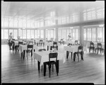 Two Waitress Setting Tables In Dining Room At Goodwin's Cabins Main Lodge by George French
