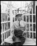 Man Sits In Trellis Area With A Meteor In His Lap by George French