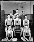 Seven Members Of The Kreuger Basketball Team, And Coach, Pose For Camera. by George French