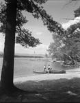 A Couple Getting Out Of A Canoe At Kezar Lake by French George