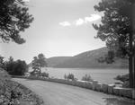 Gravel Road Along Shoreline Of Somes Sound On Mount Desert Island With Hills In Background by French George