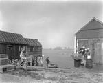 Lobster Fishermen Working Around Wharf At Owl`s Head by French George