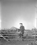 Partridge Hunter And His Dog Standing Beside A Rail Fence by French George