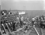 Workers On Deck Of A Vessel Under Construction In Rockland by French George