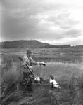 Duck Hunter With Days Bag, Dog Nearby by French George