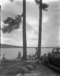 Family Picnicking Near A Lake--Bridgton by French George
