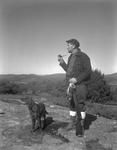 Partridge Hunter And His Dog On A Hilltop With Nice Mountain View by French George