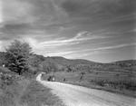 Dirt Road Paralleling Rolling Fields And Hills In Durgintown--Hiram by French George