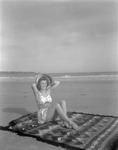 Girl Enjoying A Day Of Sunbathing by French George