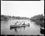 Two Women And A Man Fishing From A Canoe, One Woman Netting A Fish At Cross Lake by French George