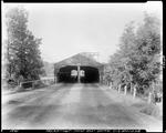 Head On Shot Of A Two Lane Covered Bridge In Oldtown by French George