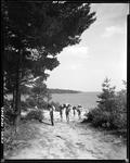Group Of Boys With Bedrolls On A Trail Near A Lake In Fryeburg by French George