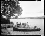 Family Getting Ready To Go Out Boating At Rangeley, Large Hotel In Distance by French George