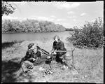 A Couple Eating Lunch Beside A Lake In Farmington by French George