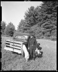 Partridge Hunter Returning To Car With Days Bag, Dog Is Entering A Cage Attached To Rear Of Car--Hiram by French George