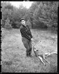Hunter Dragging An Eight Point Buck Out Of The Woods--Parsonsfield by French George