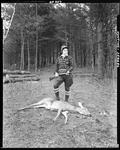 Woman Hunter Tagging A Deer In Sebago by French George