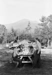 Group Of Boys Eating A Picnic Lunch Near Mount Katahdin by George W. French
