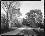 Dirt Road Leading Toward A Covered Bridge In Bethel by George French