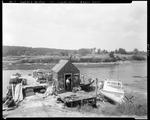 Fishermen's Wharf In South Harpswell With Two Boats Hauled Out For Painting At Basin Cove by George French