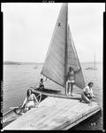 Three Young Women Getting Ready To Go Sailing, Another Is Sitting In A Canoe Beside The Float by George French