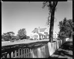 House In Suburban Setting With Nice Picket Fence Out Front In Kennebunk by George French
