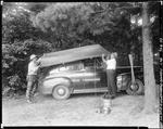 Two Men Loading Boat Onto Car After Days Fishing In Parsonsfield by George French