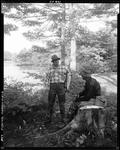 Two Men Displaying Stringer Of Fish In Parsonsfield, One Man Sitting by George French