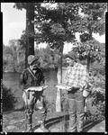 Two Men Displaying Stringer Of Fish, Both Men Standing In Parsonsfield by George French