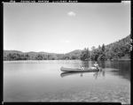 A Couple In A Canoe On Bickford Pond In Porter by George French
