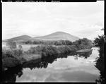 Bigelow Mountain And Clouds Reflected In A River In Stratton by George French