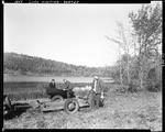 Two Duck Hunters Loading A Canoe Onto A Trailer At Spectacle Pond In Porter by George French