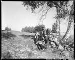 Man & Woman Sitting On A Rock After A Day Of Partridge Hunting In Porter by George French