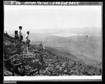 Two Men Standing On Saddleback Mountain, Nice View Of Lake And Valley by George W. French