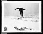 Person Coming Off A Ski Jump by George W. French