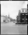 Shot From Corner Of Street Showing Street, Houses, And A Church In Biddeford by George French