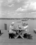 Five Ladies Eating Lobster At A Picnic Table On A Wharf In Boothbay Harbor by George French