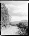 Gravel Road And Mountain Views In Evans Notch by George French